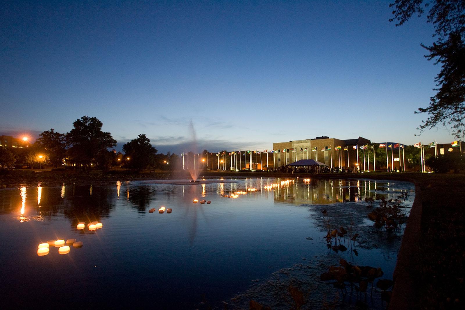 国际广场, seen here at night from across Colden池塘, was completed entirely through $400,捐款额达5万元, with the most generous donation from 乔伊斯 and Harvey White, a couple with long-standing ties to Northwest.